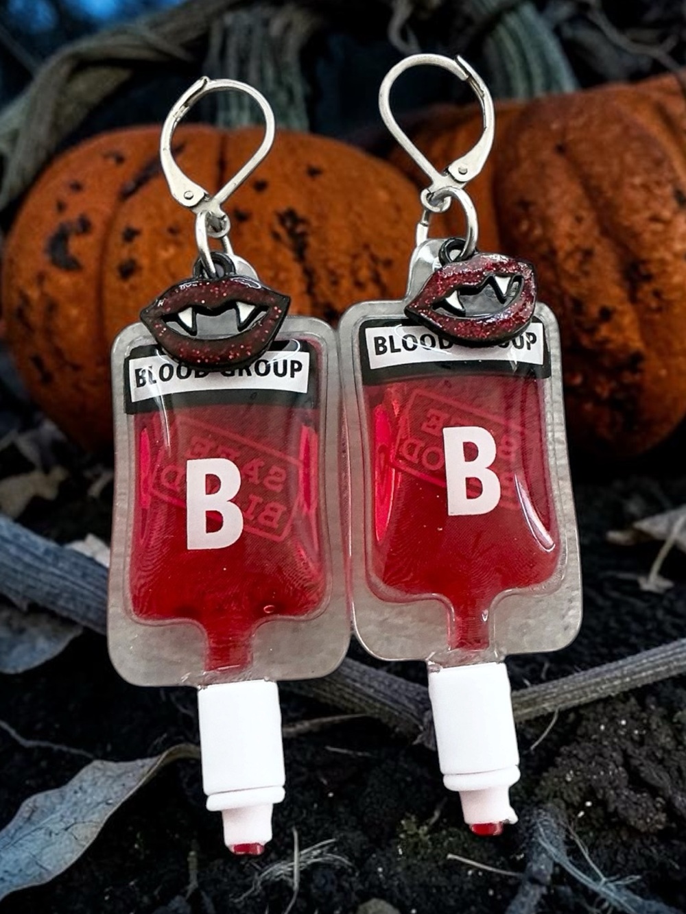 🆕 B Blood Bag with Vampire Teeth Dangle Earrings